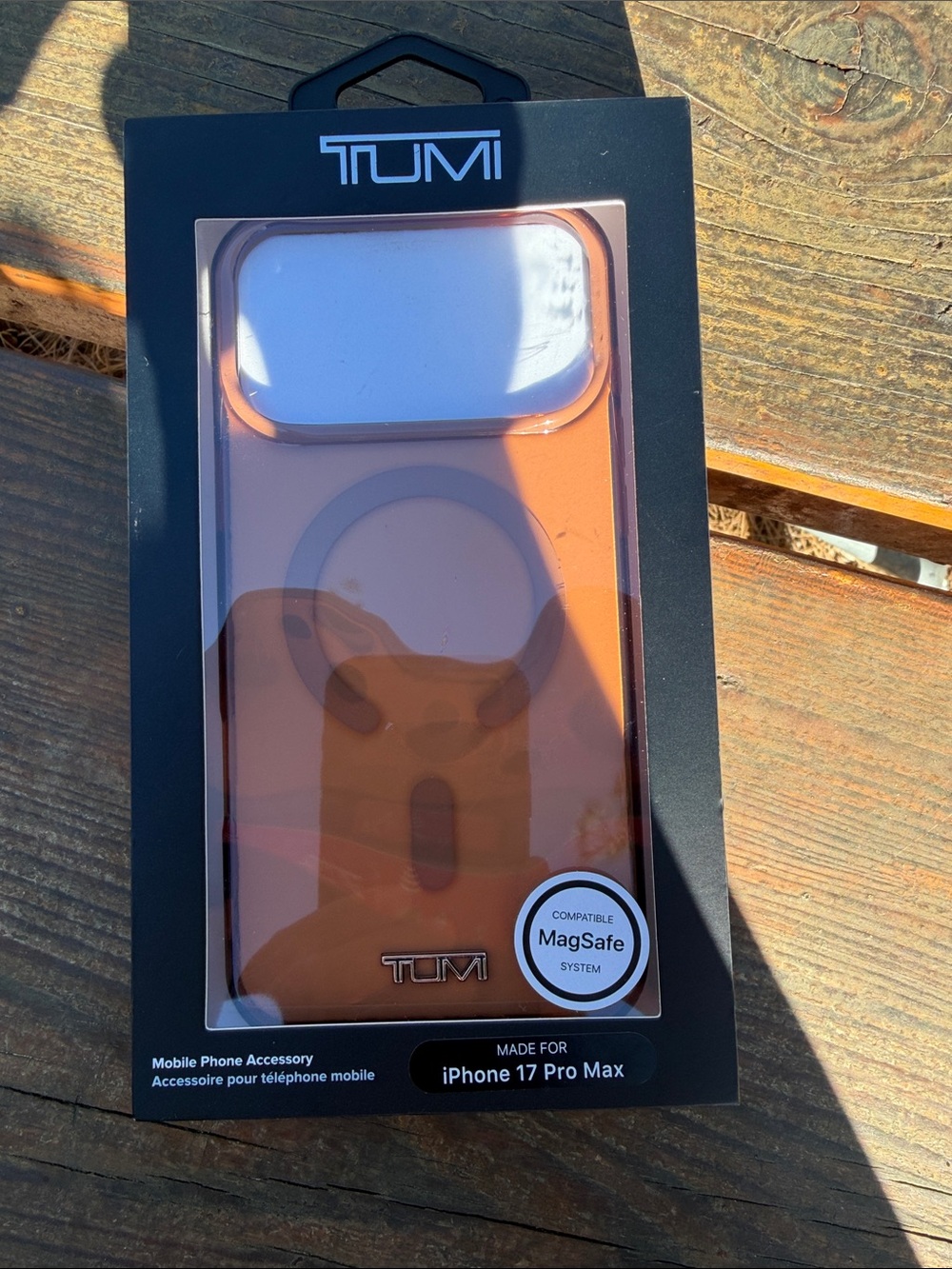 Tumi MagSafe Compatible iPhone 17 Pro Max Case in clear orange